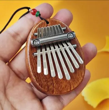 1 unidad de mini piano de pulgar de madera, juguetes musicales, 8 tonos, piano de dedo portátil para principiantes